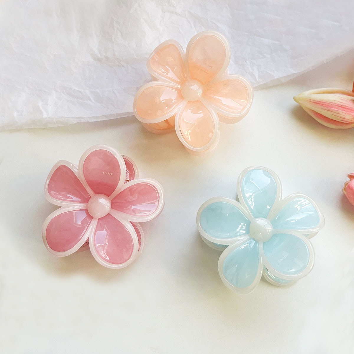 Pink yellow and blue flower clips