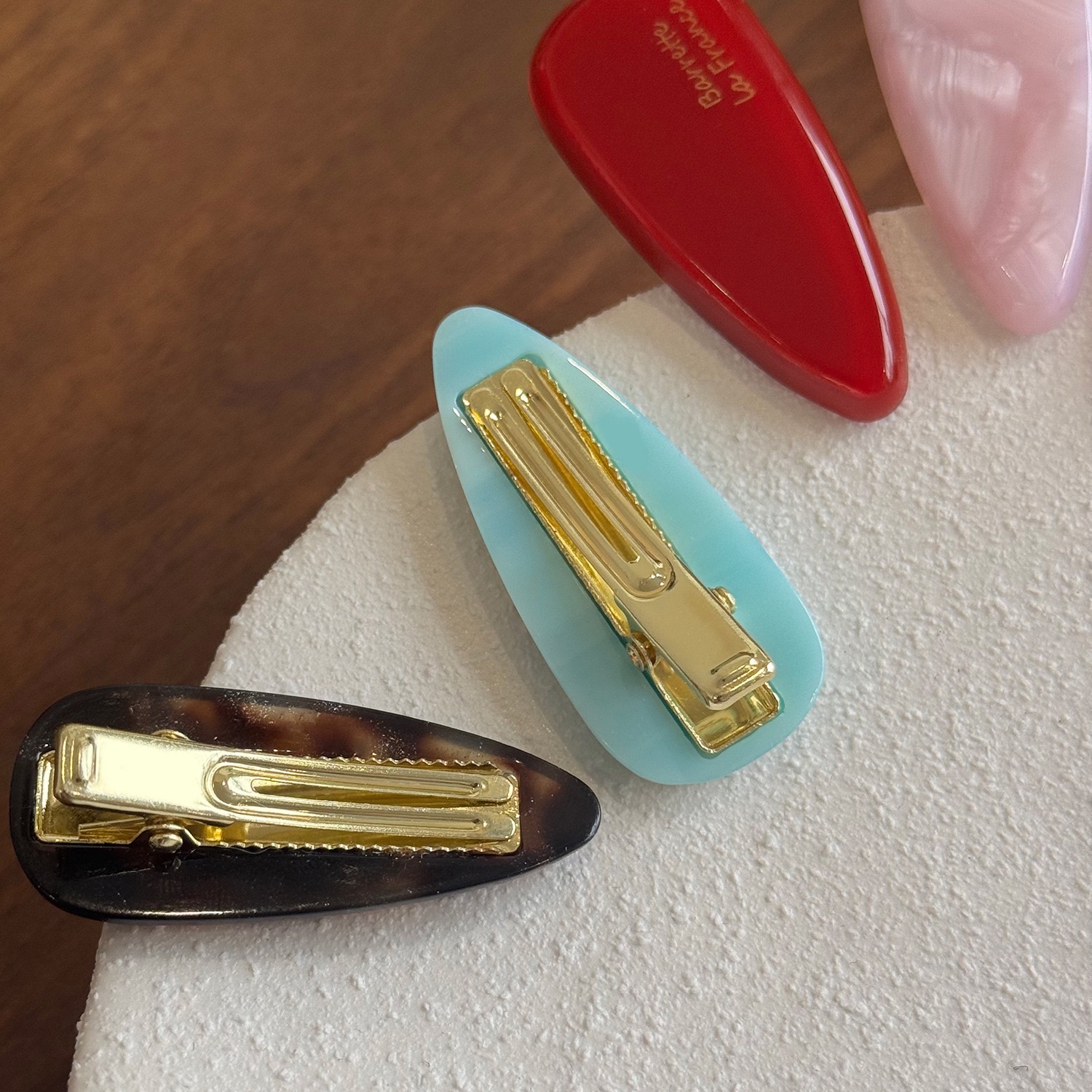 Gold-tone clip hardware